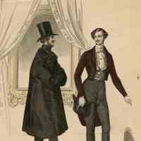2 Men in Lobby, One in Large Coat