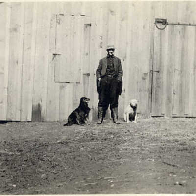 Unidentified Man & His Dogs
