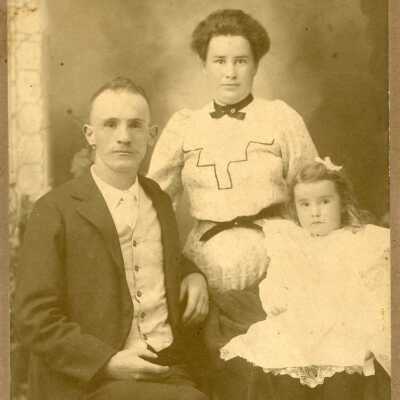 Unidentified Man, Woman & Small Girl