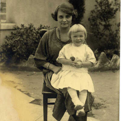 Unidentified lady and small girl