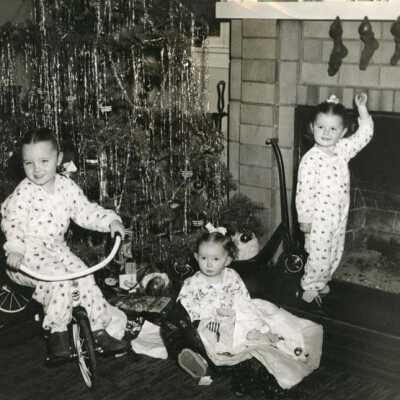 Three Little Girls By Christmas Tree
