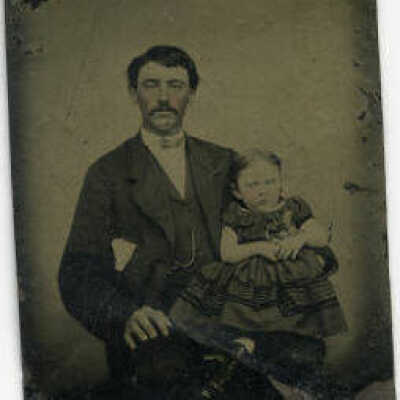 Unidentified man with child