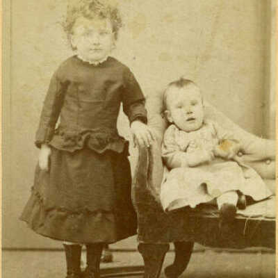 Unidentified Young Girl And Baby