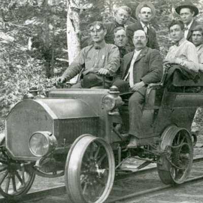 Men in rail motorized car