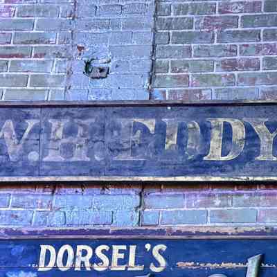 W.H. Eddy's Wooden Sign