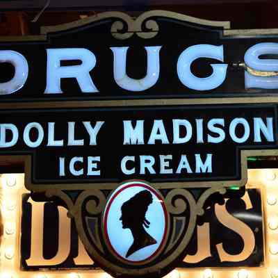 Drugs Dolly Madison Tin & Opal Glass Sign