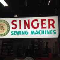 Singer Sewing Machines Sign