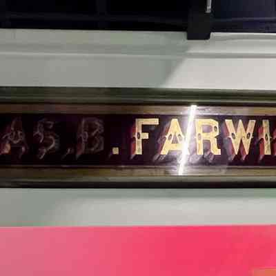 Chas B. Farwick Glass Sign