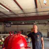          Image of Alan Whitaker next to the Roto-Sphere
   