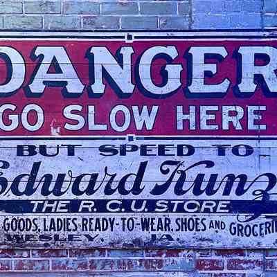 Danger Go Slow Painted Sign