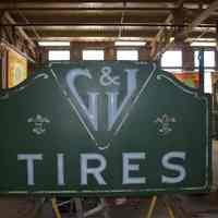 G&J Tires Double-Faced Metal & Opal Glass Sign