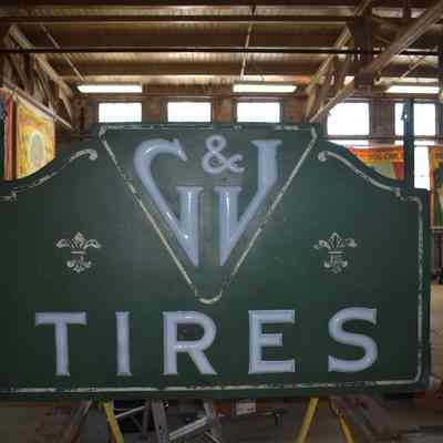 G&J Tires Double-Faced Metal & Opal Glass Sign