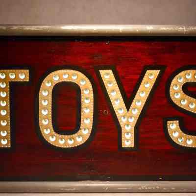Punch-out "TOYS" Metal sign