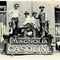 J.B. McMath, Minor McMath and other Figures with Magnolia Gasoline Sign - Photo