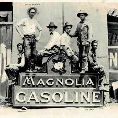 J.B. McMath, Minor McMath and other Figures with Magnolia Gasoline Sign - Photo