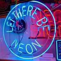 Let There Be Neon Skeleton Sign