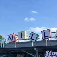 Tot to Teen Village Sign