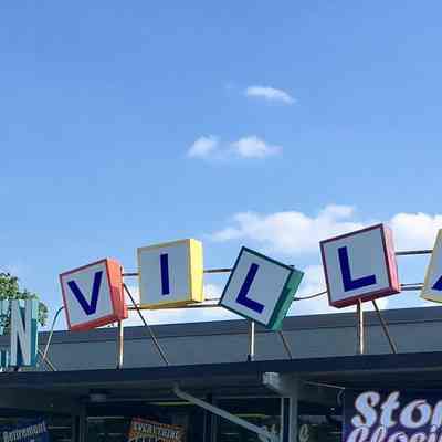 Tot to Teen Village Sign