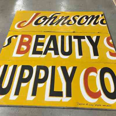 Cassius Clay Sr. Beauty Shop Sign