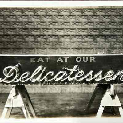 Delicatessen Early Neon Sign - Photograph