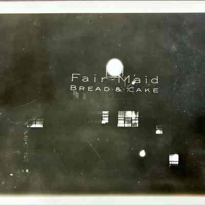 Fair Maid Bread & Cake Early Neon Sign at Night - Photograph