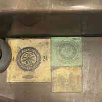          Three lbels indicating this was made by varying unions.
   