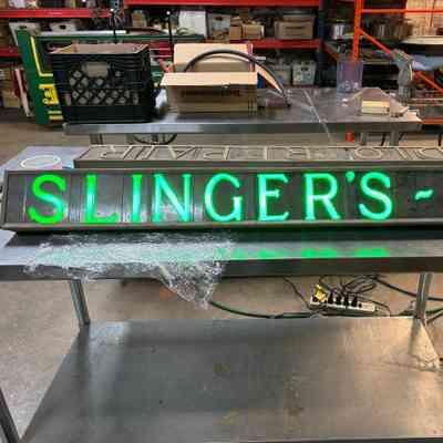 Slinger's TV/Radio Repair Signs