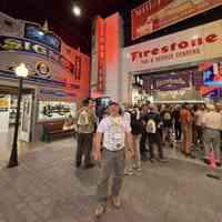          Myke Baugh (donor) with the Firestone sign; This photo was taken at a letterheads event after the opening of the museum's expansion
   