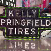 Kelly Springfield Tires Punch-Out Button Sign