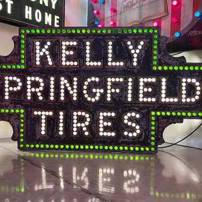Kelly Springfield Tires Punch-Out Button Sign