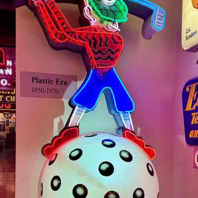 Golfer on Golf Ball Neon & Plastic Sign