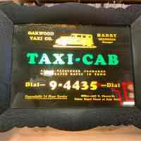 Oakwood Taxi Co. Point-of-Purchase Sign
