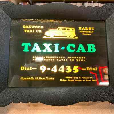 Oakwood Taxi Co. Point-of-Purchase Sign