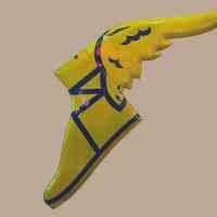 Goodyear Winged Shoe Porcelain Enamel Sign