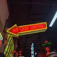 We Cash Checks Neon Arrow