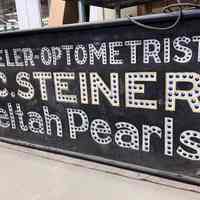 H.C. Steiner Jeweler-Optometrist Punch Out Sign