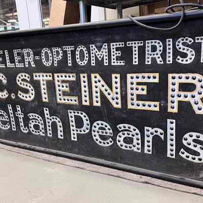 H.C. Steiner Jeweler-Optometrist Punch Out Sign