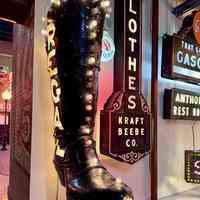 Regal Boot Neon and Lightbulb Sign
