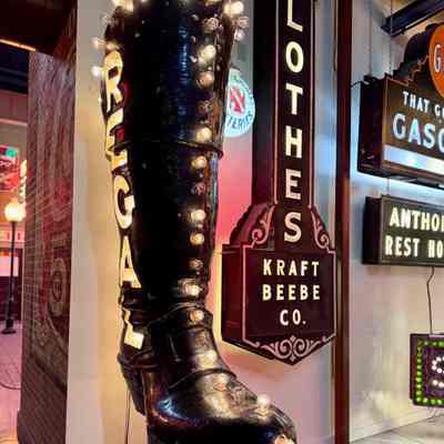 Regal Boot Neon and Lightbulb Sign