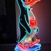 Animated Penguin Point Neon Sign