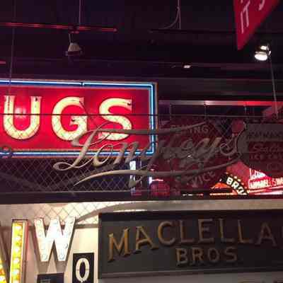 Longley's Wooden Script on Wire Mesh Background Sign
