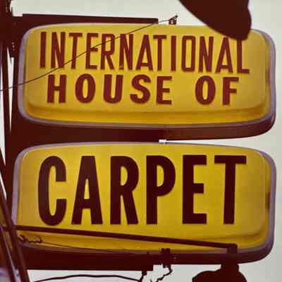 International House of Carpet Plastic Sign