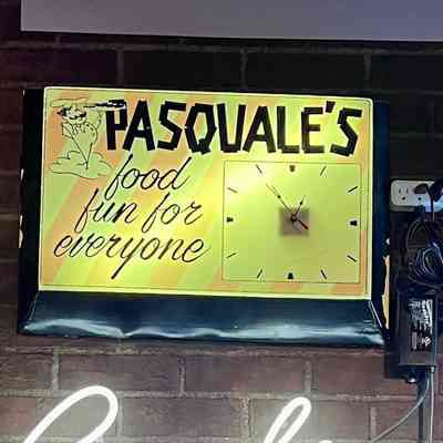 Pasquale's Plastic Clock Sign
