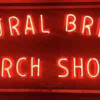 Natural Bridge Arch Shoes Ripple Tin & Early Neon Sign