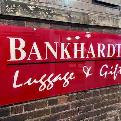 Bankhardt's Luggage Plastic Sign