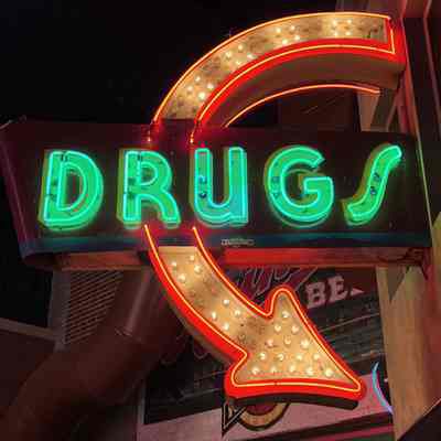 Drugs Double-Faced Arrow Neon & Lightbulb Sign