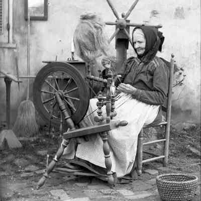 woman at spinning wheel