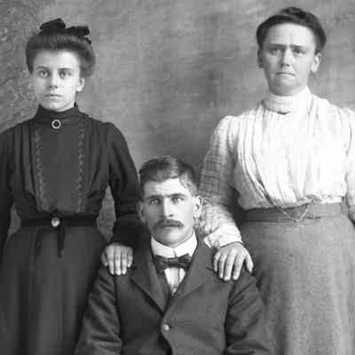 woman, man, woman