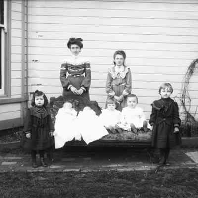 woman, young woman, 6 children