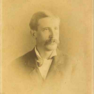 The sepia-toned portrait depicts James Meriwether Shellman, II, the younger brother of Mary Bostwick Shellman, wearing a suit and tie.